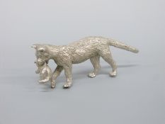 A white metal model of a cat with a kitten in her mouth, length 6.