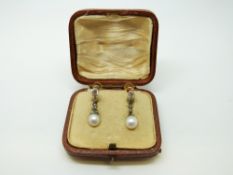 A pair of Victorian earrings each set with a drop pearl and a diamond, in original box, 2.