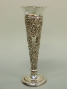 An Edward VII / Victorian hallmarked silver repoussé decorated vase London 1901,