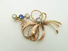 An 9ct bi-coloured gold ring set with four diamonds (size N)