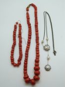 A coral necklace and matching bracelet together with a silver necklace set with pearls