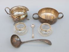 A pair of cut glass hallmarked silver mounted salts, plated two handled bowl, jug,