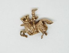 A 9ct gold charm/ pendant set with knight on a horse, 6.