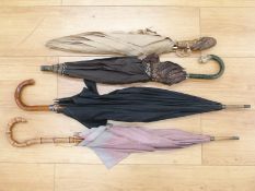 Four various Paragon Fox and other parasols including novelty examples