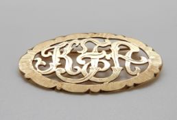 A yellow metal brooch marked 14ct gold, 4.5 x 2.5cm, 6.
