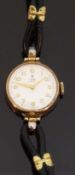 Tudor Royal 9ct gold ladies wristwatch with gold hands and Arabic numerals, on black leather strap,