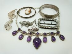 Two silver bangles, a Victorian paste buckle, filigree brooches,