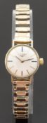 Longines gold plated ladies wristwatch with two tone hands and baton markers, on metal bracelet,