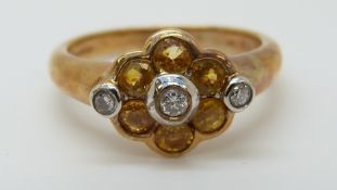 A 9ct white gold ring set with citrine and diamonds (size O)
