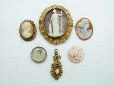 A yellow metal Victorian brooch set with a cameo within a leaf border,