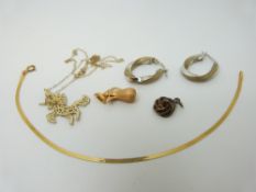 A 9ct gold necklace and pendant in the form of a unicorn, a 9ct gold bracelet,
