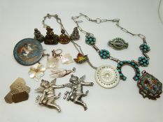 A silver charm in the form of Guanyin, micro mosaic pendant, silver cufflinks,