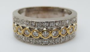 An 18ct white gold ring set with diamonds totalling approximately 0.51ct, 7.