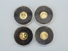 Four miniature gold coins comprising Andora 5 Diners,