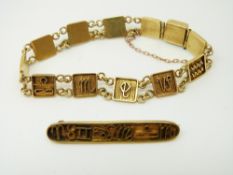 A yellow metal Egyptian bracelet and matching brooch, 19.