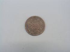 A 1710 Queen Anne shilling