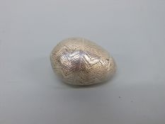 A mid 18thC white metal three part pomander, vinaigrette or spice holder of ovoid form,