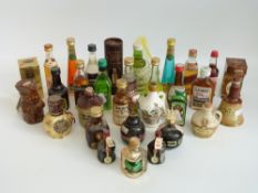 A quantity of alcohol miniatures to include Glen Garioch 10 year and Cardhu 12 year single malt