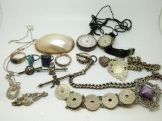 A silver fob watch, a silver Ingersoll watch, five silver rings, a Victorian swallow brooch,