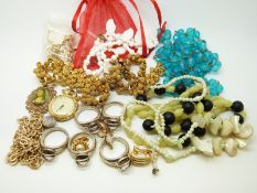 A small collection of costume jewellery to include silver rings and citrines