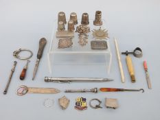 Two silver/ white metal pencils, silver handle, silver bookmark, silver thimble, white metal items,