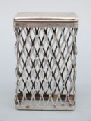 An Aspreys hallmarked silver cigarette packet holder of mesh form, London 1958,