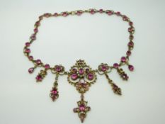 An Austro-Hungarian necklace set with pink tourmaline and seed pearls
