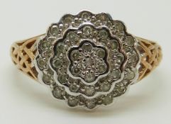 A 9ct gold ring set diamonds in a flower cluster, total diamond weight approximately 0.25ct, 2.