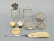 A quantity of Art Deco hallmarked and ivory dressing table items including some loose lids etc.