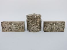 A set of three Burmese or Indian white metal boxes comprising circular example,