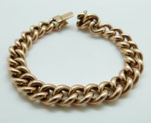 A 15ct rose gold curb link bracelet, 24.