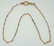 An 18ct bi-coloured gold watch chain made up of elongated links, 7.