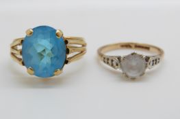 An 18ct gold ring set with a blue topaz and a 9ct gold ring set with paste (size K and M/N)