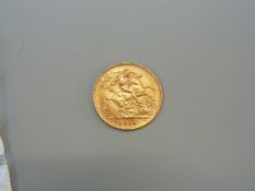 A 1914 gold half sovereign.