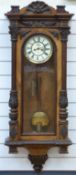 A late 19th / early 20thC Vienna regulator two train wall clock with brass weights,