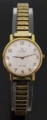Omega De Ville gold plated ladies wristwatch with Arabic numerals and white face,