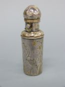 A Mappin and Webb aesthetic period scent or perfume bottle engraved with herons amongst foliage,