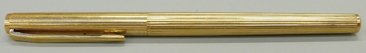 Montblanc Noblesse slimline gold plated rollerball pen with reeded barrel and cap and white star