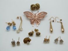 A 9ct gold filigree butterfly (3.