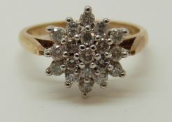 A 9ct gold ring set with diamonds in a cluster, total diamond weight approximately 0.5ct, 2.