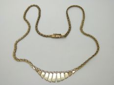 A 9ct gold necklace, 11.