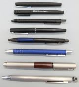 Seven Lamy pens comprising two fountain pens,