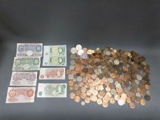 A collection of sundry largely UK coinage, modern crowns, bank notes etc,