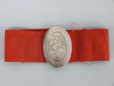 A hallmarked silver belt buckle from St George's Hospital, Knightsbridge, London,