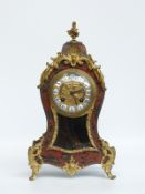 A mid to late 19thC Louis XIV style boulle work mantel clock with ormulu mounts,