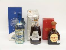 Three bottles of alcohol comprising Ron Quorhum rum 70cl 40%,