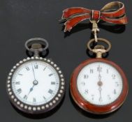 A silver ladies fob watch set with blue guilloché enamel 20mm dial and gilt inlay to the bezel and