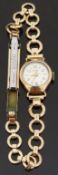 Lacorda 9ct gold ladies wristwatch with gold hands and markers, on yellow metal bracelet,