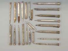 Approximately 24 hallmarked silver and white metal propelling pencils including Butler,
