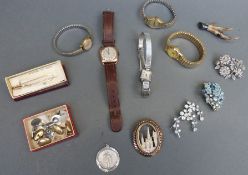 A collection of watches and costume jewellery including a 9ct gold gentleman's cushion shaped